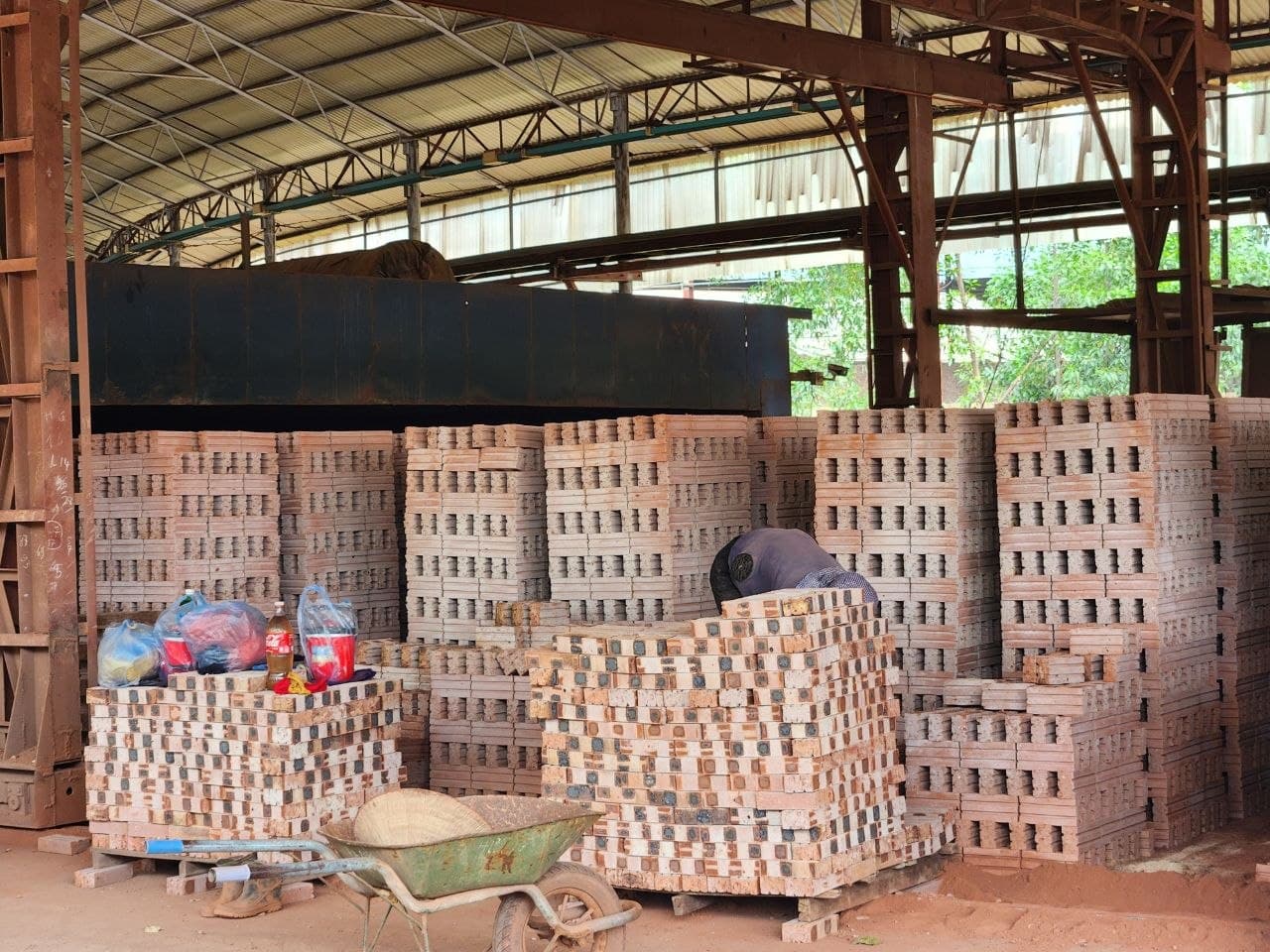 Finished brick bundles prepared in the facility's covered storage area.